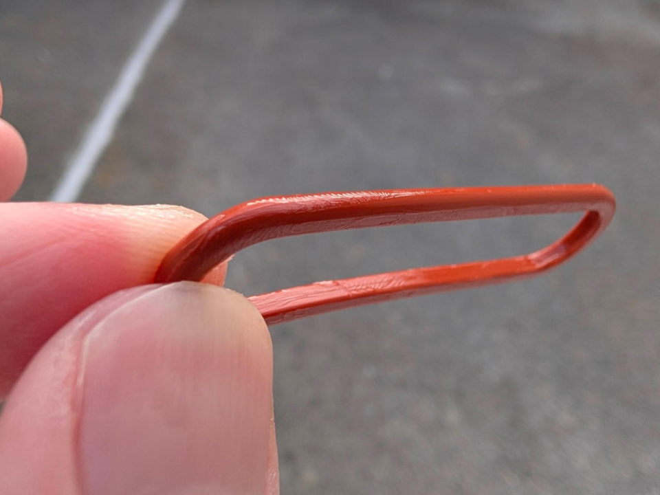 A close-up showing a small amount of silicone grease being applied to a rubber O-ring, ensuring a thin, even coat across the entire surface